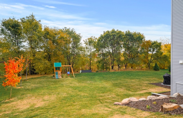 view of yard with a playground