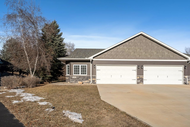 ranch-style home featuring a garage