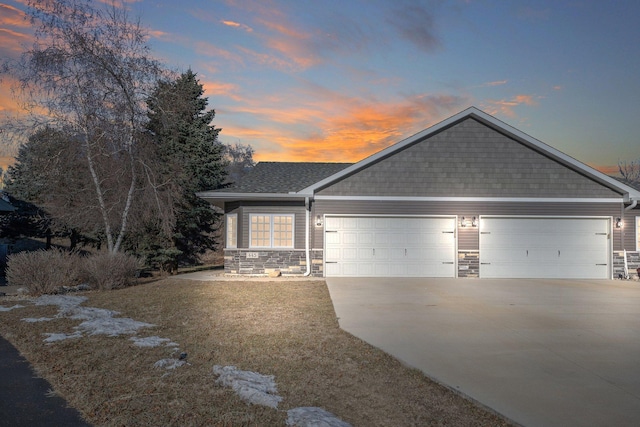 view of front of property featuring a garage