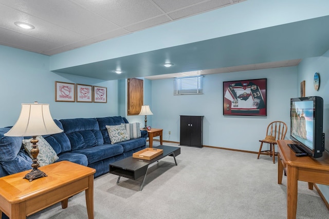 living room featuring light colored carpet and baseboards