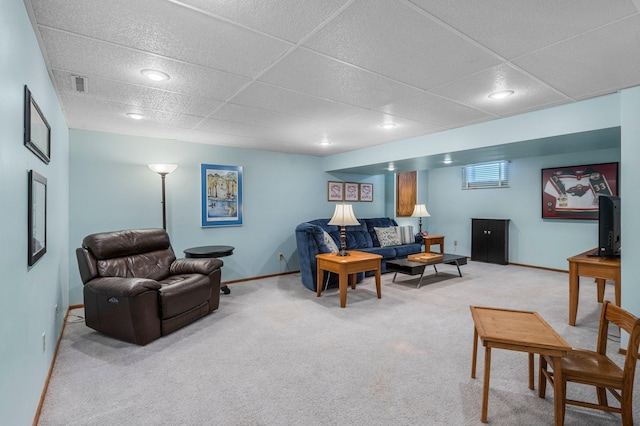 living room featuring visible vents, baseboards, a drop ceiling, light colored carpet, and recessed lighting