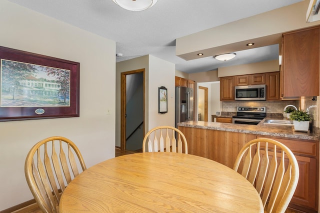 dining space with baseboards