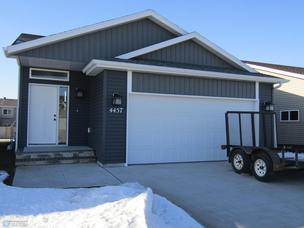 view of front of property with a garage