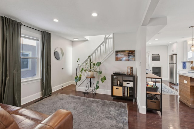 living room featuring dark hardwood / wood-style floors