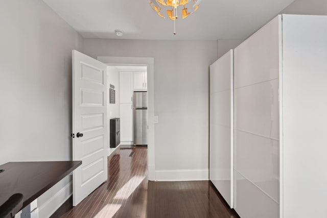 hallway featuring dark hardwood / wood-style floors