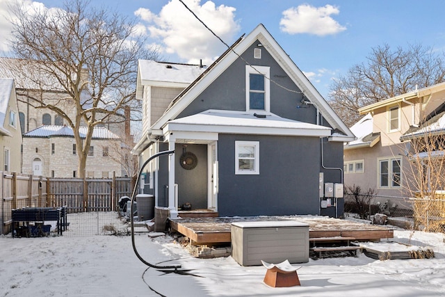 view of snow covered house