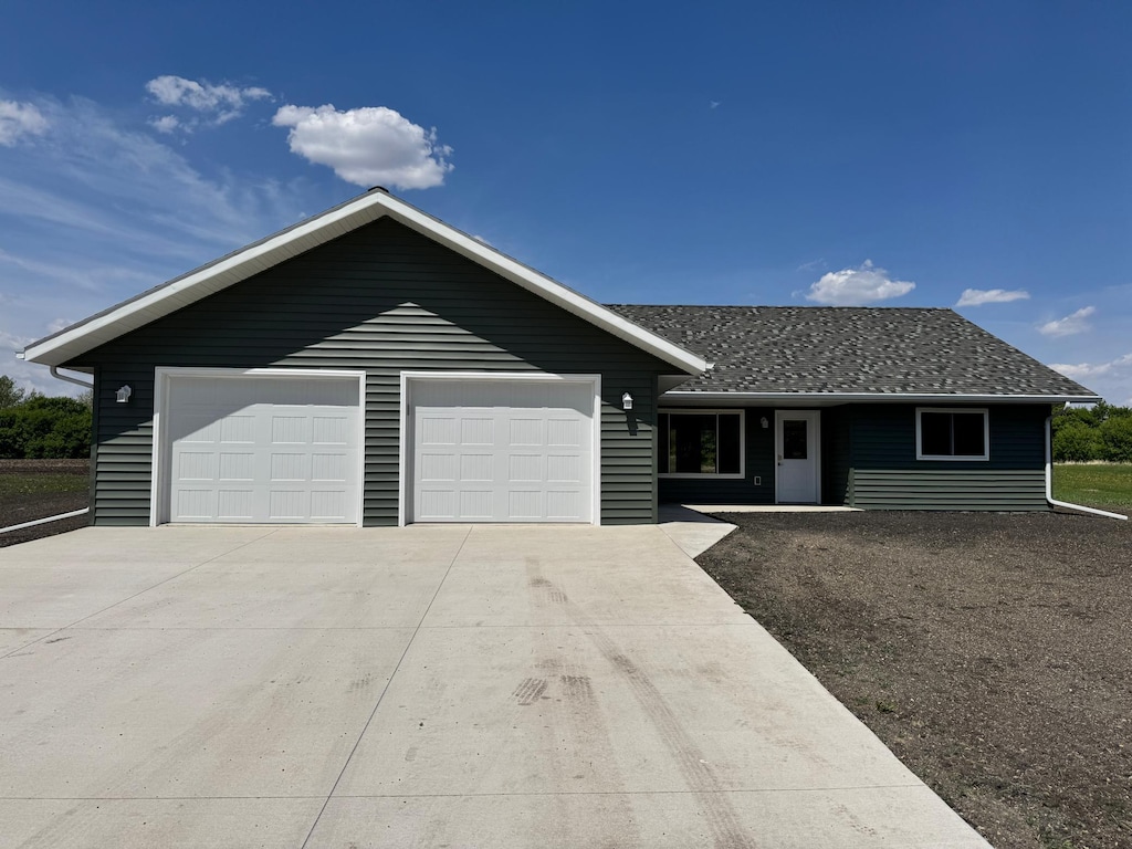 106 Front St, Tracy, MN 56175 - ranch-style house with driveway