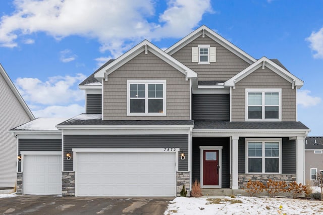 craftsman-style home featuring a garage