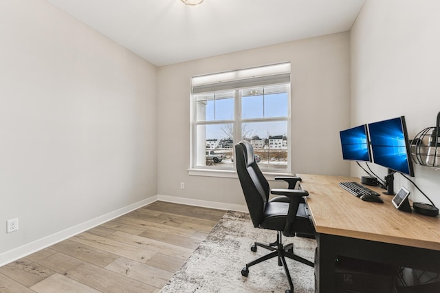 office with hardwood / wood-style flooring