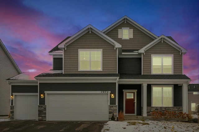 craftsman house featuring a garage