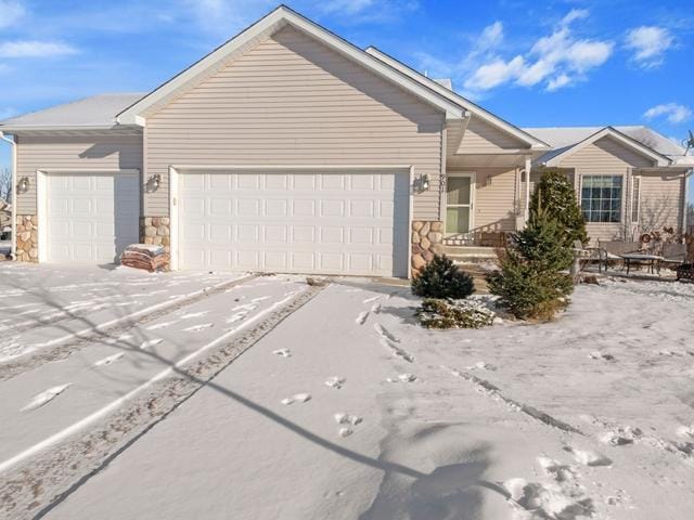 ranch-style home with a garage