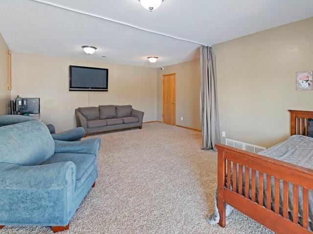 bedroom with light colored carpet