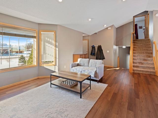 living room with dark wood-type flooring