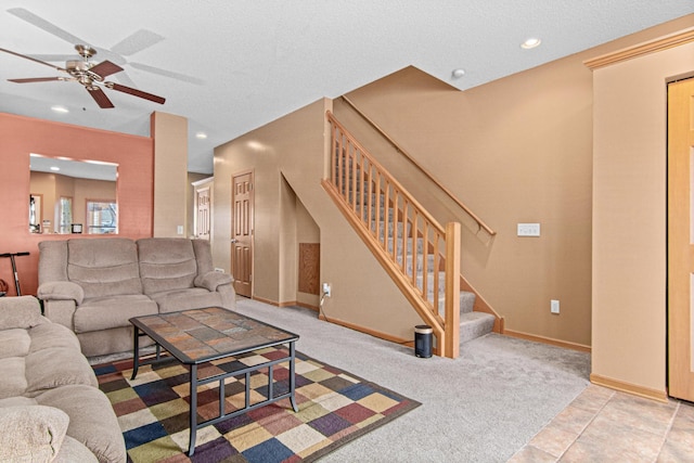 carpeted living room featuring ceiling fan