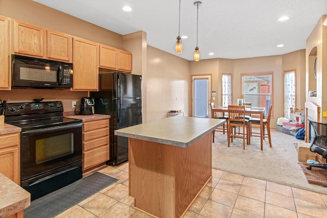 kitchen featuring light tile patterned flooring, pendant lighting, a center island, black appliances, and light brown cabinets