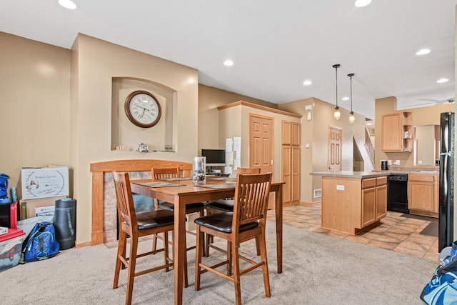 dining room with light carpet