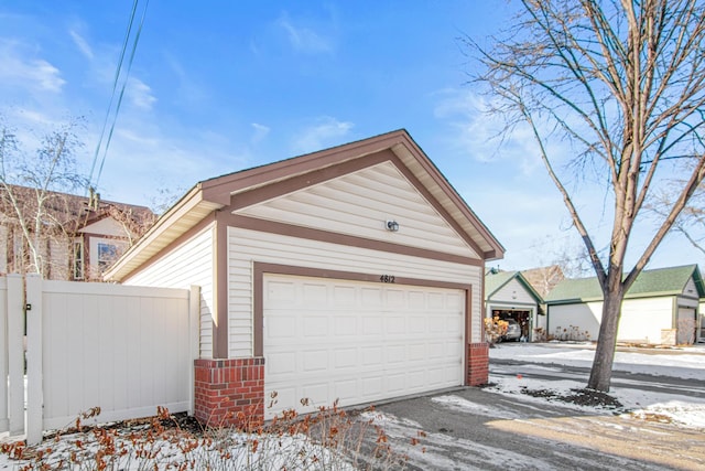 view of snow covered garage