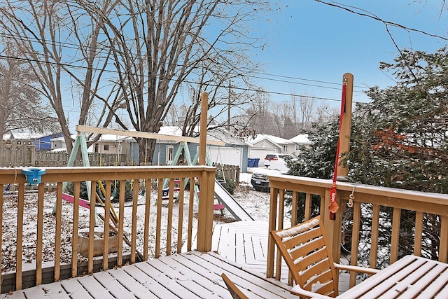 view of snow covered deck