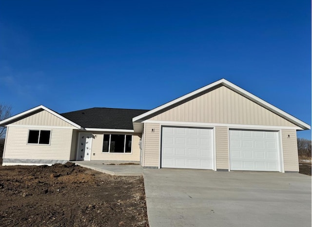 single story home featuring driveway