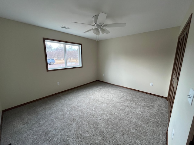 unfurnished bedroom with visible vents, ceiling fan, baseboards, and carpet floors