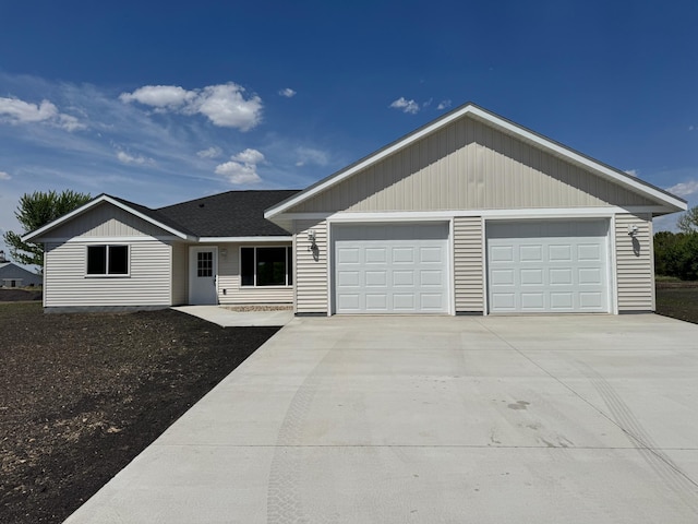 146 Front St, Tracy, MN 56175 - single story home with concrete driveway and a garage