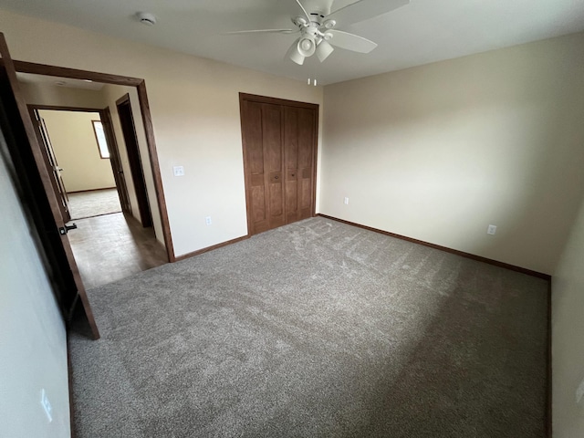 146 Front St, Tracy, MN 56175 - unfurnished bedroom with carpet, a closet, and ceiling fan