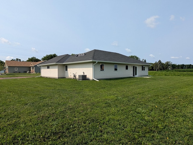 146 Front St, Tracy, MN 56175 - view of home's exterior featuring a yard and a central air condition unit