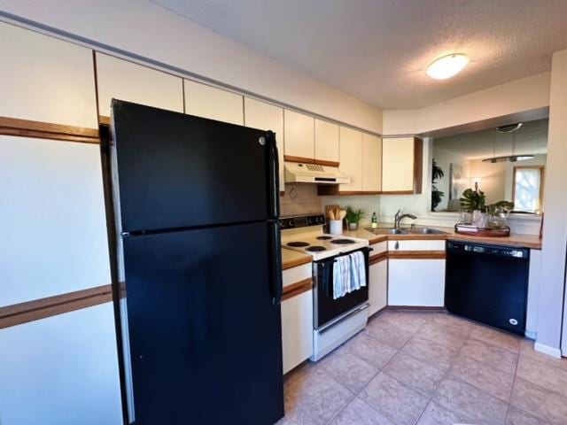 kitchen with white cabinets, a textured ceiling, sink, and black appliances