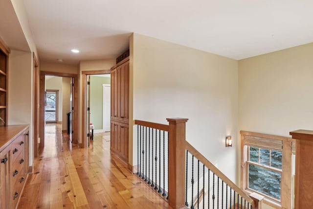 hallway with light wood-type flooring