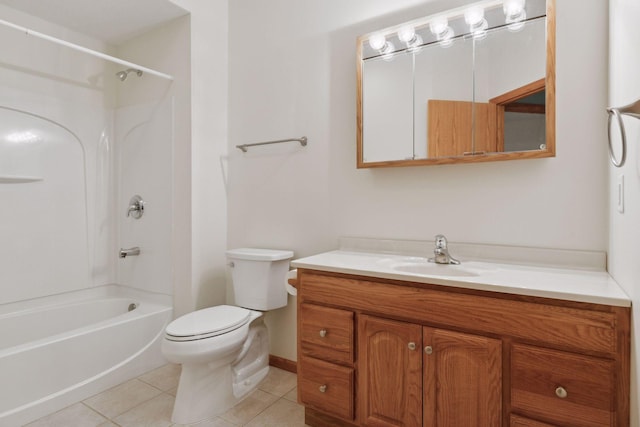 bathroom featuring tile patterned flooring, toilet, vanity, and tub / shower combination