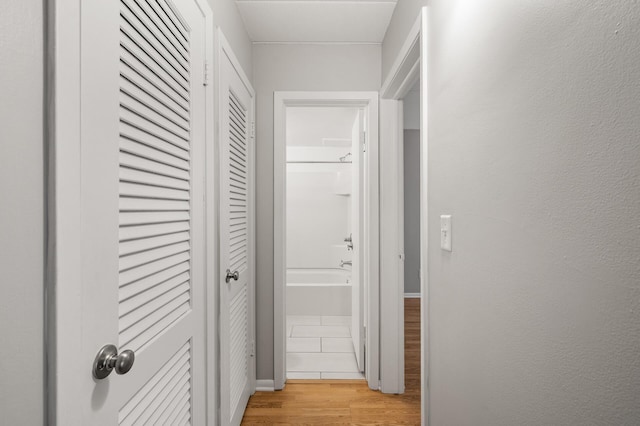 hall featuring light hardwood / wood-style floors