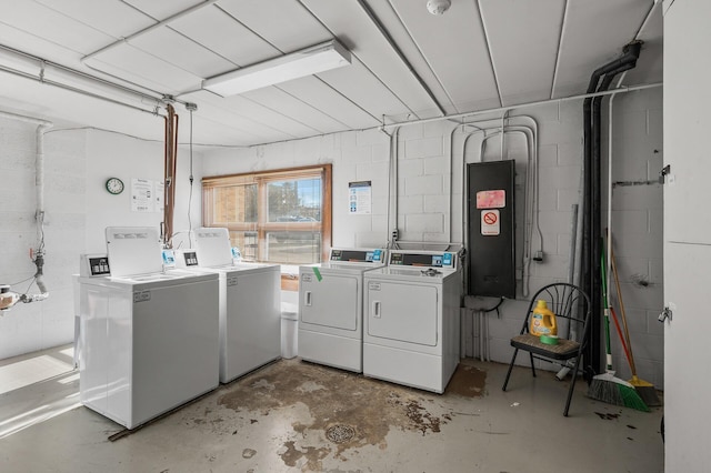 laundry room featuring washer and clothes dryer