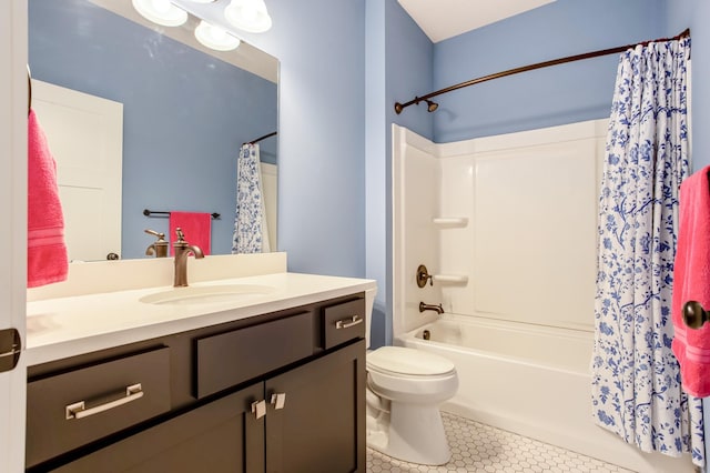 full bathroom with toilet, tile patterned floors, shower / bathtub combination with curtain, and vanity