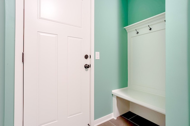 mudroom with light tile patterned floors