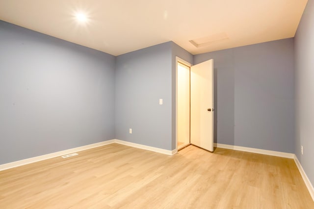 unfurnished room featuring light wood-type flooring