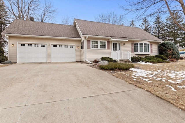 single story home with a garage