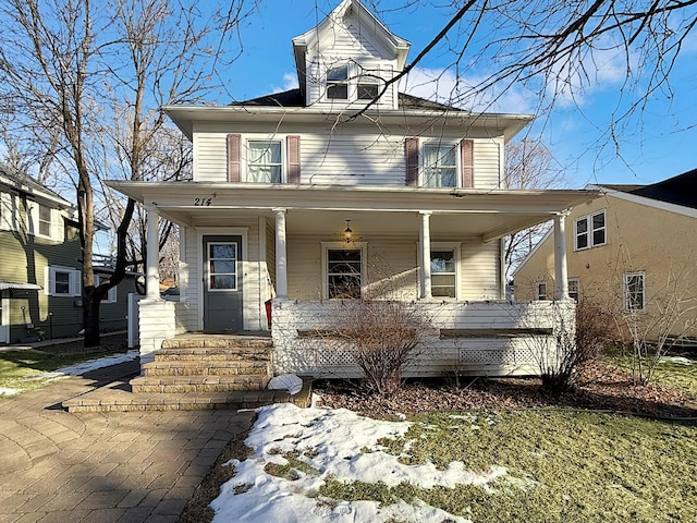 view of front facade featuring covered porch and central air condition unit