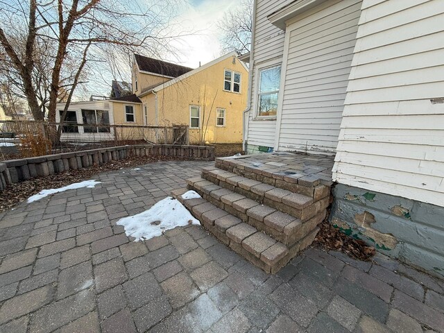 view of patio / terrace featuring fence