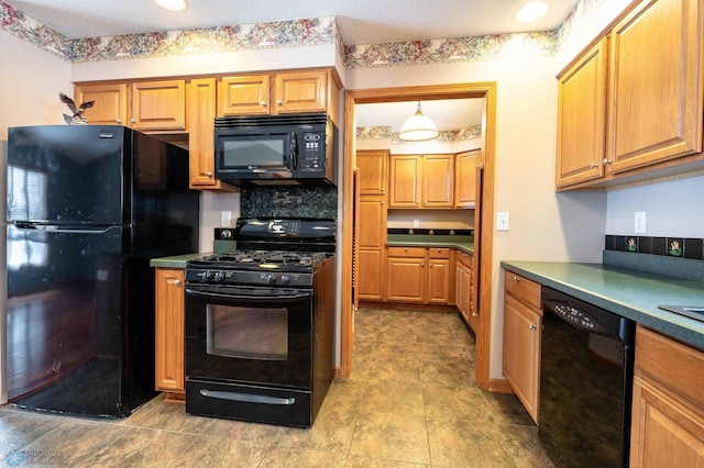 kitchen with backsplash and black appliances