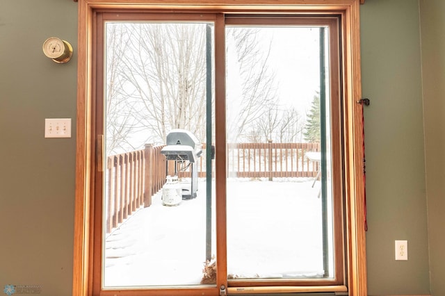 doorway to outside featuring plenty of natural light