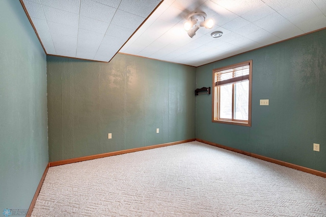 unfurnished room with carpet flooring