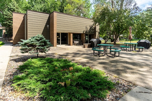 view of community with a patio