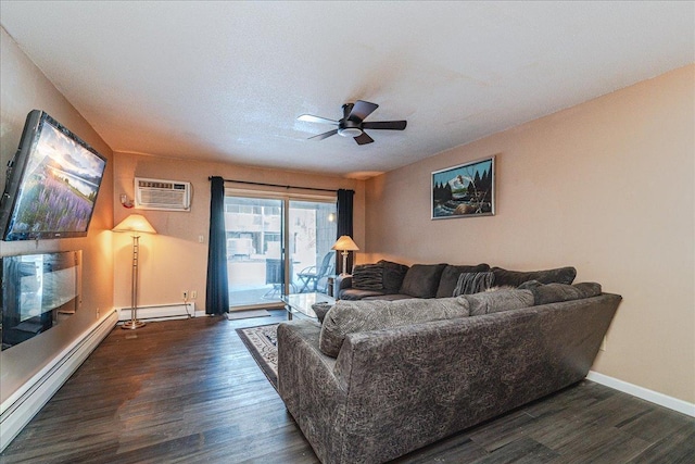 living room with dark wood-type flooring, a baseboard radiator, and a wall mounted air conditioner