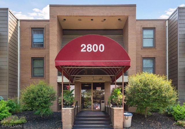 2800 Hamline Ave N Unit 150, Roseville, MN 55113 - view of exterior entry with brick siding