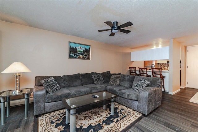 2800 Hamline Ave N Unit 150, Roseville, MN 55113 - living room with a ceiling fan, wood finished floors, a textured ceiling, and baseboards
