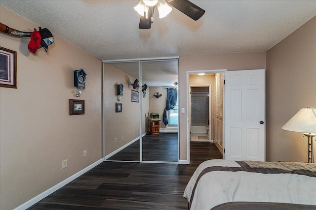 2800 Hamline Ave N Unit 150, Roseville, MN 55113 - bedroom featuring wood finished floors, baseboards, ceiling fan, ensuite bath, and a closet