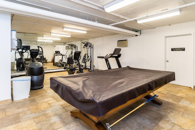 2800 Hamline Ave N Unit 150, Roseville, MN 55113 - workout area featuring stone tile flooring, billiards table, and an AC wall unit