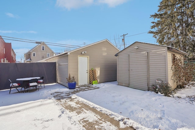 view of snow covered garage