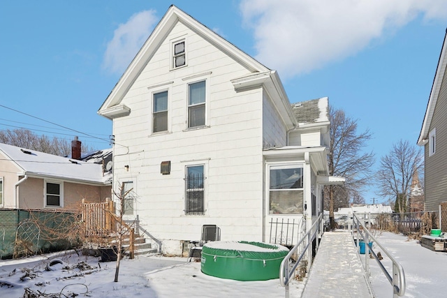 view of snow covered property