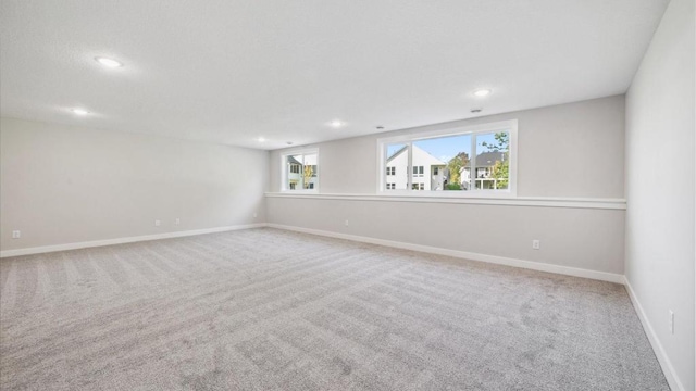 unfurnished room with carpet flooring